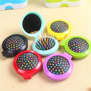 Compact Pop-Up Brush with Mirror